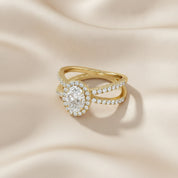 Oval Halo Solitaire Criss Cross Lab Grown Diamond Engagement Ring