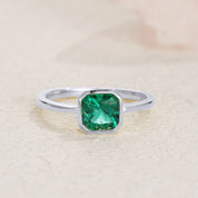 Era Emerald Solitaire Engagement Ring