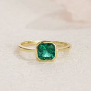 Era Emerald Solitaire Engagement Ring