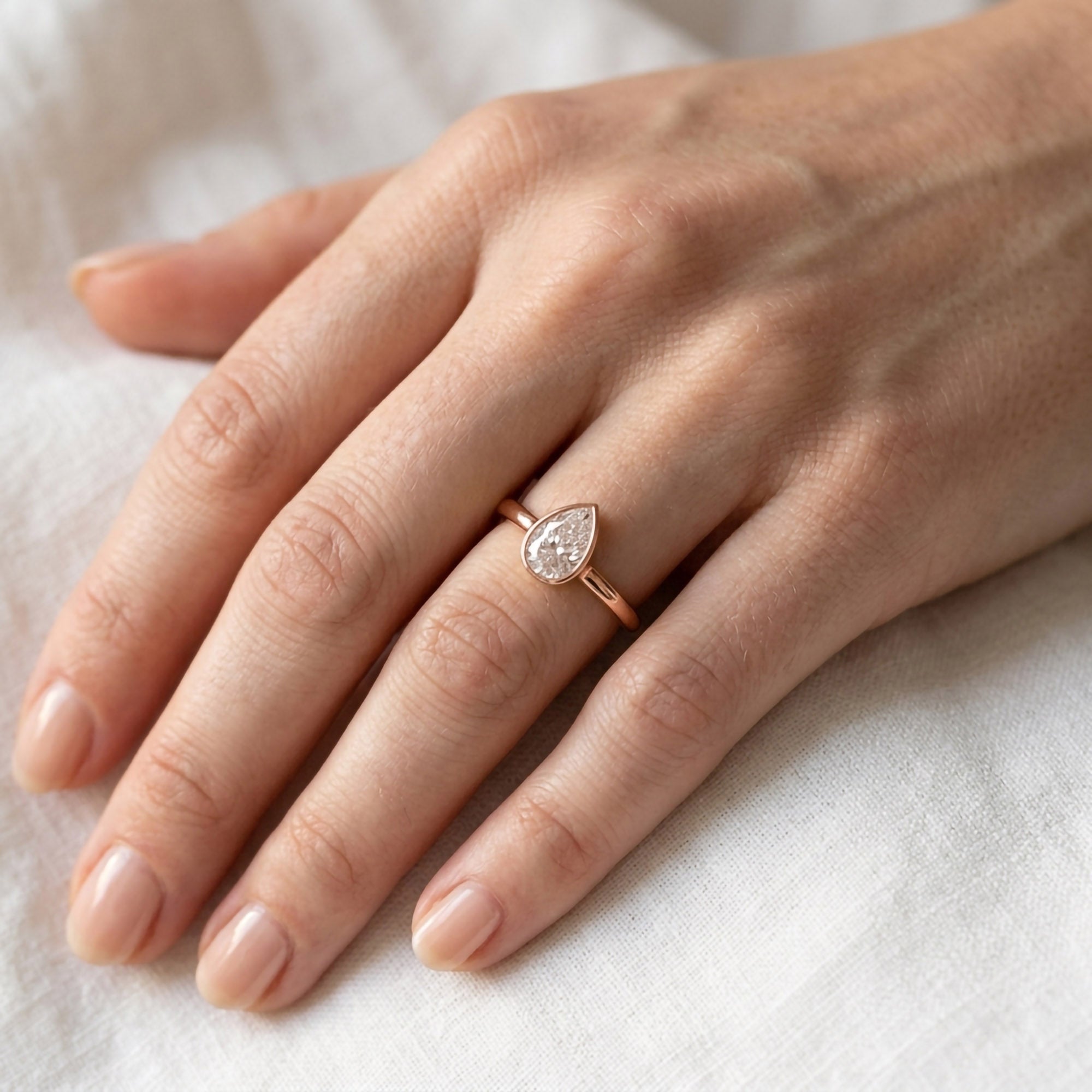 Zelie Pear Cut Bezel Set Lab Grown Diamond Engagement Ring