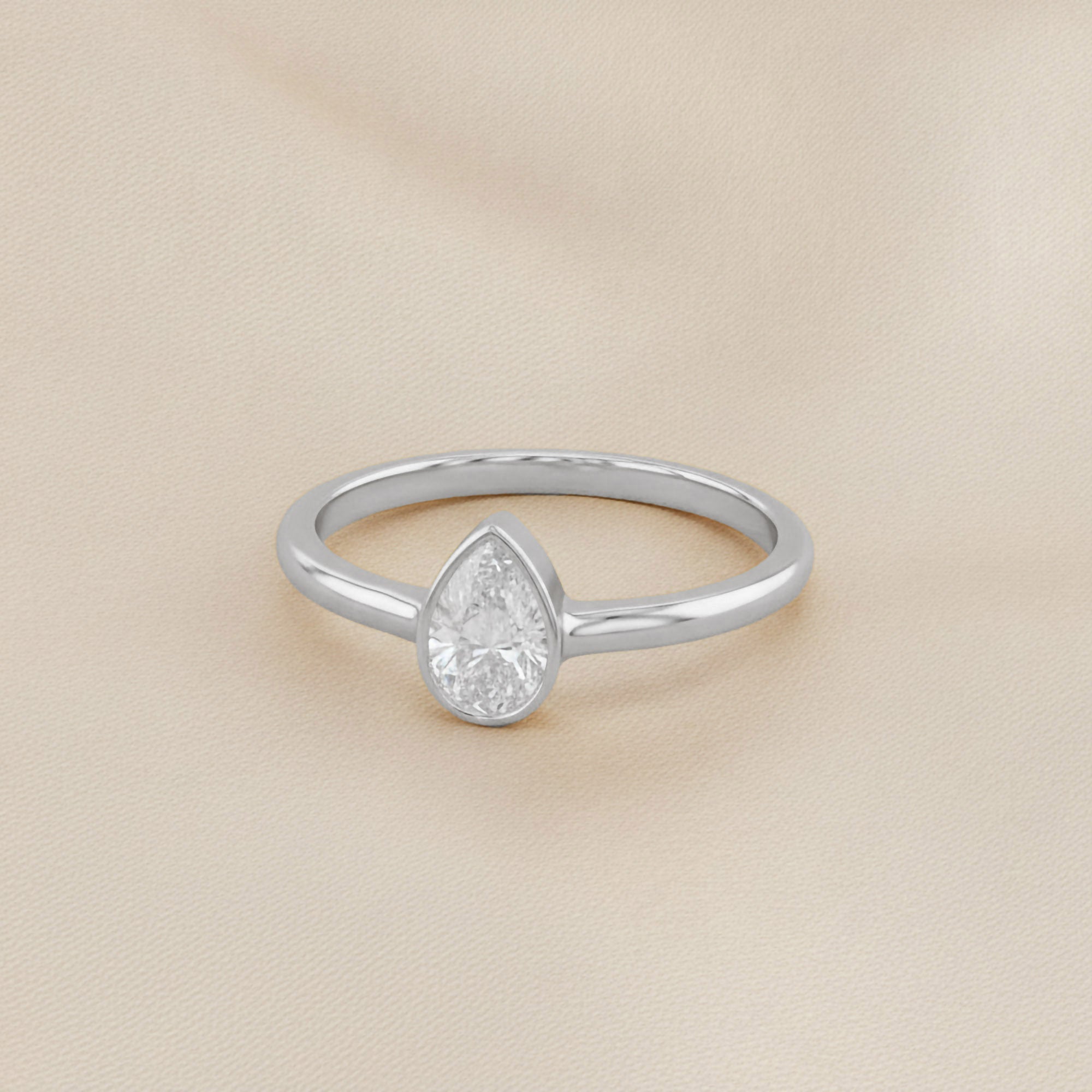 Zelie Pear Cut Bezel Set Lab Grown Diamond Engagement Ring