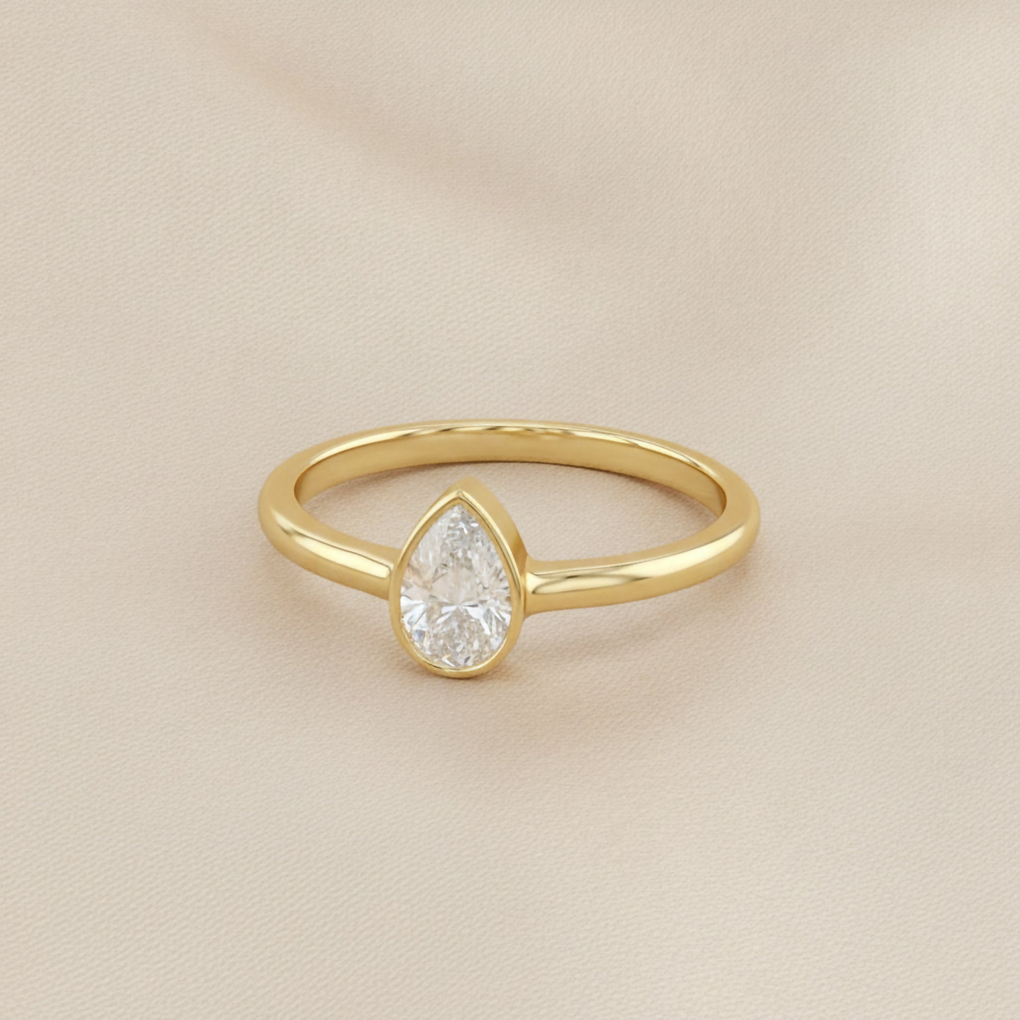 Zelie Pear Cut Bezel Set Lab Grown Diamond Engagement Ring