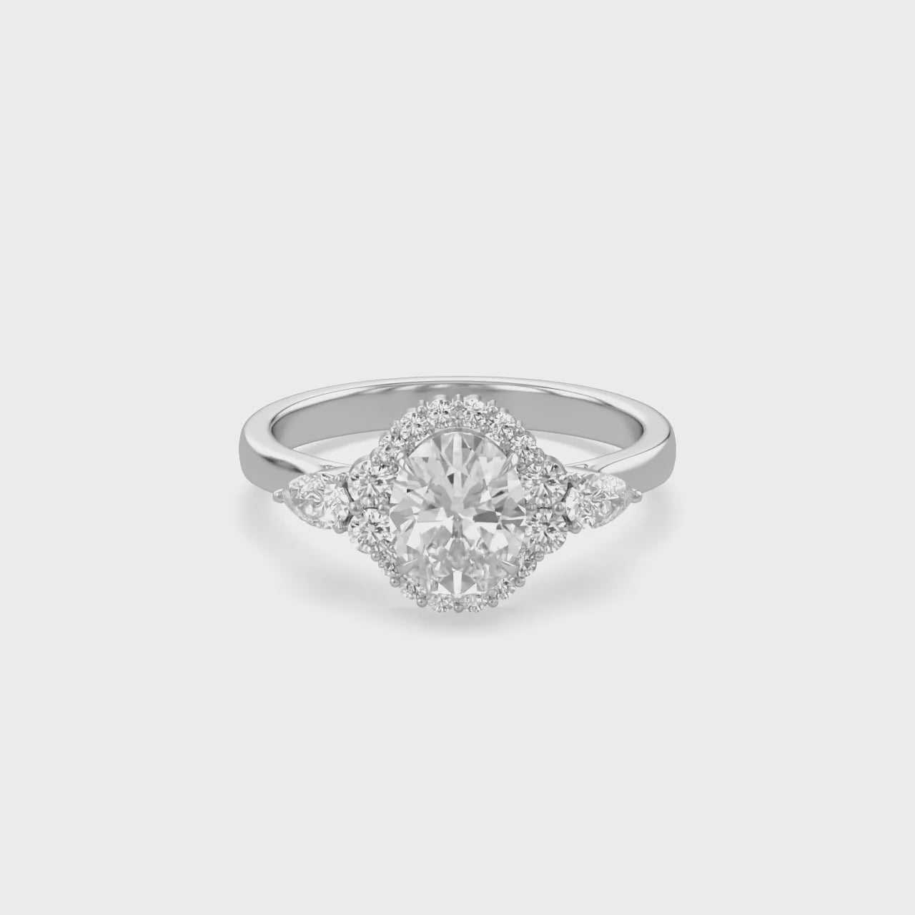 Lori 3 Stone Halo Oval Cut Lab Grown Diamond Engagement Ring